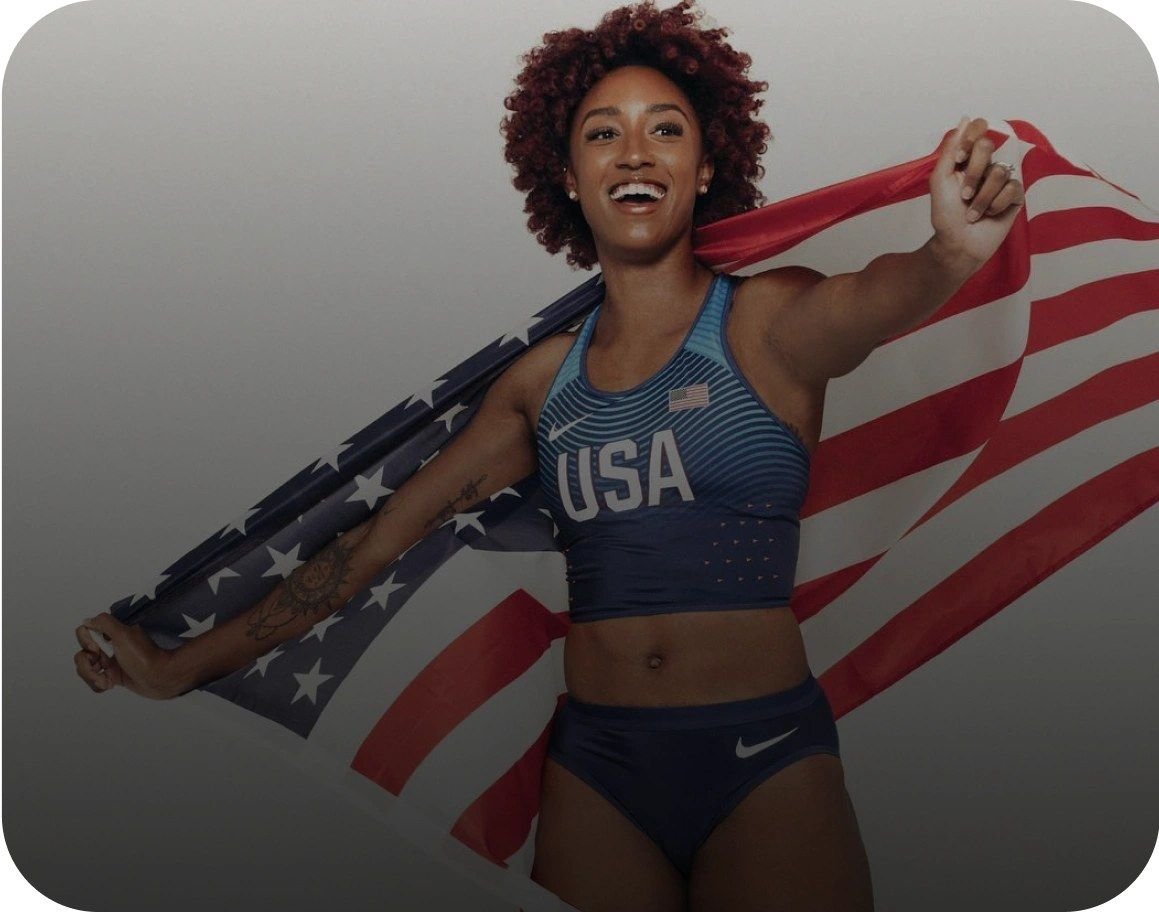 Brianna McNeal, Olympic gold medal hurdler, holding the Hume Body Pod sensor bar